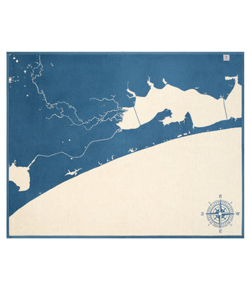 Blue and cream map blanket showing 30A coastal region with compass rose design in lower right corner.8