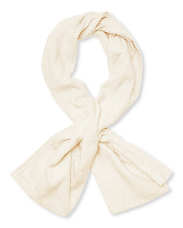 Cream-colored shawl with herringbone weave pattern, tied in a knot at center.5