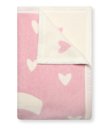 Pink and cream midi blanket with white heart pattern throughout, folded to show both sides.8