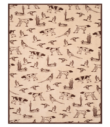 Cream blanket with brown all-over print of hunting dogs, flying birds, and marsh grasses.3