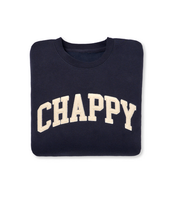 Navy crewneck sweatshirt with "CHAPPY" text in cream across the chest.7