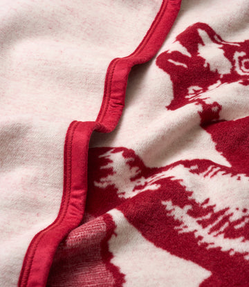 Cream and red blanket with red binding edge and California bear design in dark red.3
