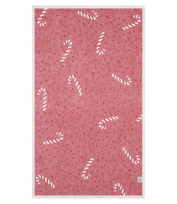 Red blanket with white candy cane pattern scattered throughout.7