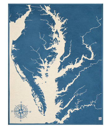 Blue and cream blanket with Chesapeake Bay map and compass rose design.5