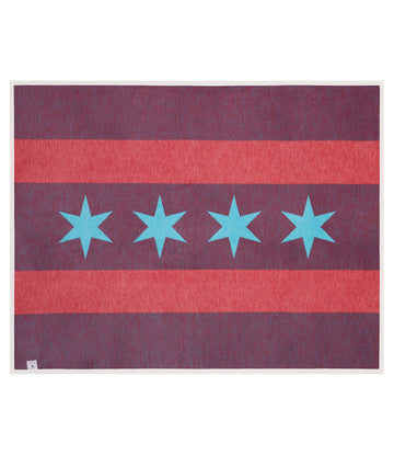 Red and blue striped blanket with four turquoise stars in the center row.5