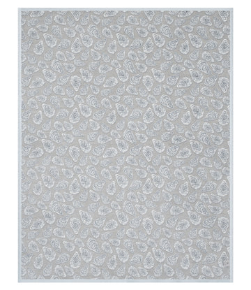 Gray blanket with white shell-shaped pattern repeated throughout on light blue border.8