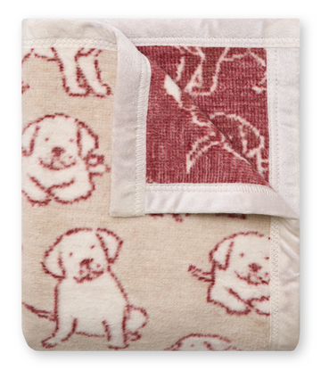 Mini blanket with red and cream puppy pattern and reversible burgundy design with white trim.6