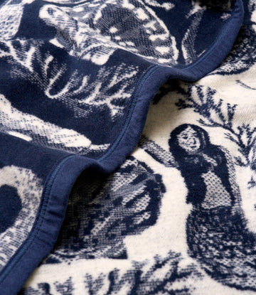 Navy and cream blanket with mermaid jacquard pattern and binding edge detail.8