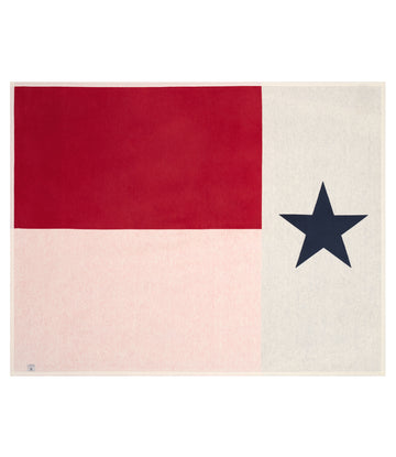 Blanket with red and white horizontal sections and a navy star on cream background.5